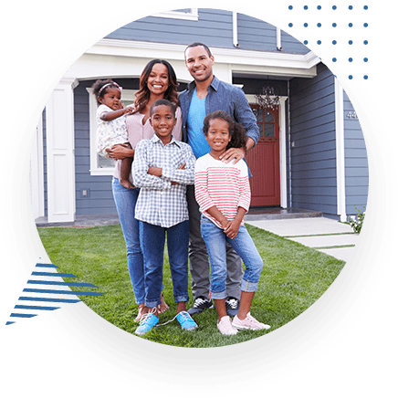 Family Standing In Front Of New Home