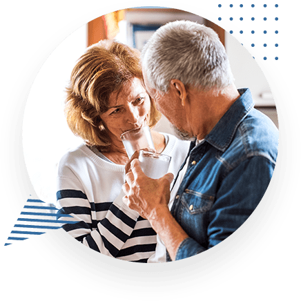 Happy Elderly Couple In Kitchen