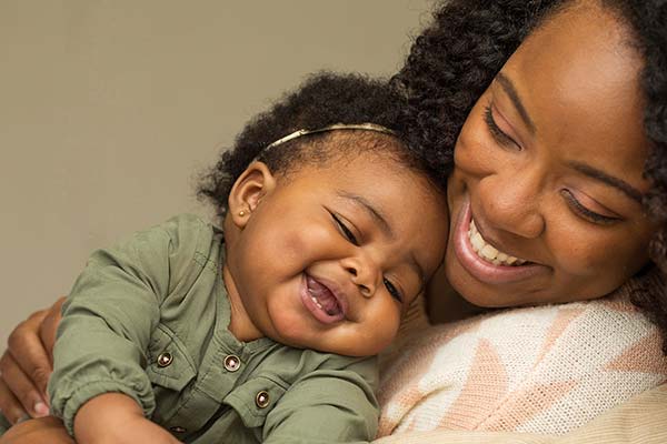 happy baby and mother