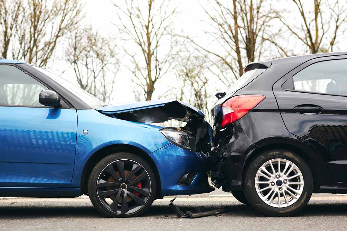 two damaged cars involved in road traffic accident